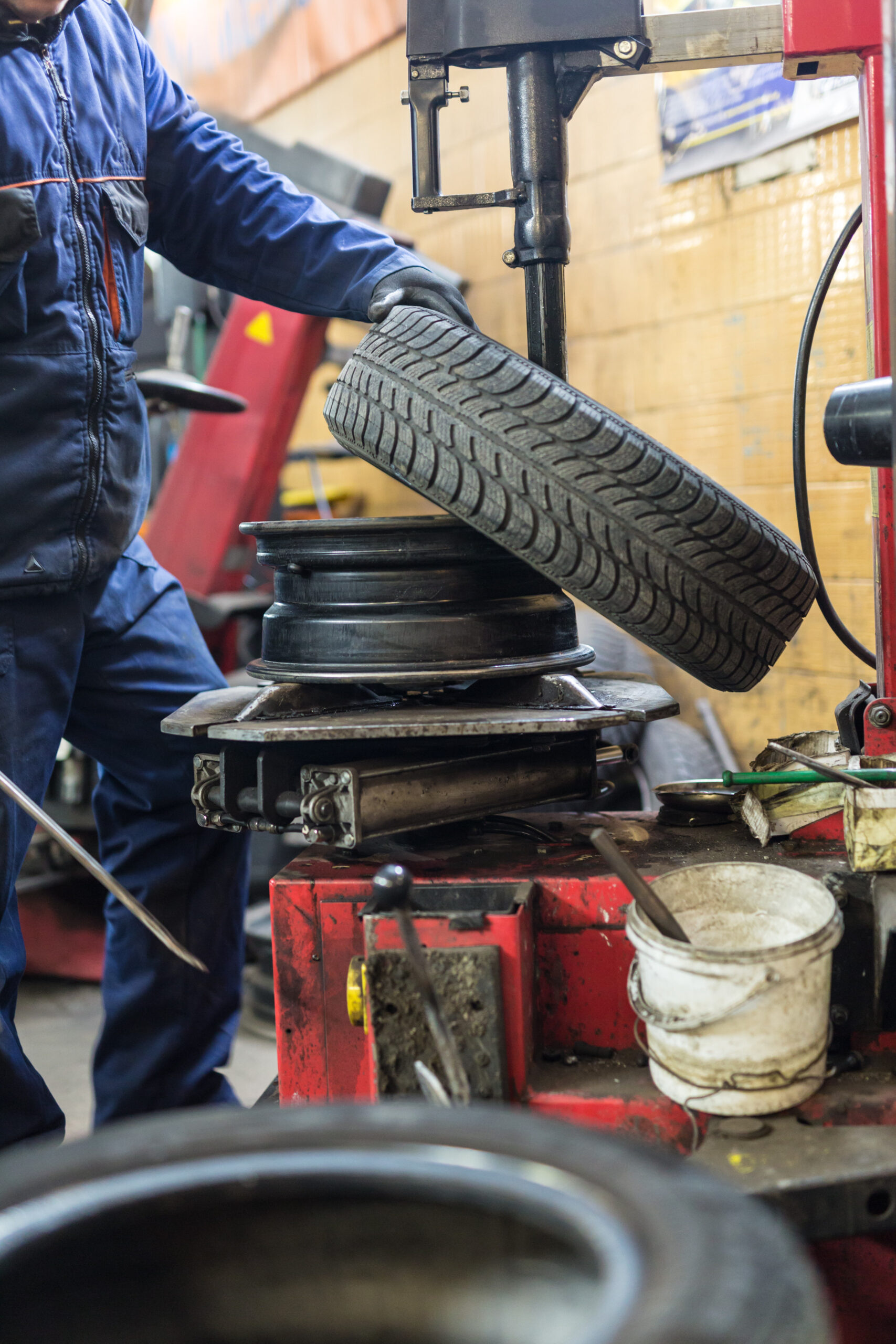 Repairman writes car tires fix invoice
